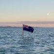 Bandera de Nueva Zelanda en el mar - Eastern Beach Auckland - Ange Chile